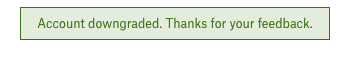 A tightly cropped screenshot of a green banner that reads "Account downgraded. Thanks for your feedback."